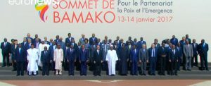 PC chairman Faiez Serraj stands on the side of summit group photograph