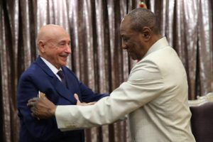 Ageela Saleh with Guinea's president Alpha Condé (Photo: HoR)