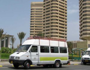 Tripoli's cheapest public transport is the crowded mini-bus