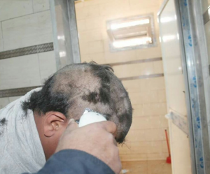 Police in Marj shave head of young men harassing females (Photo: Scial emdia)